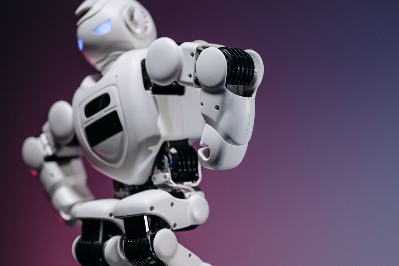 Services Close-up of a futuristic white robot showcasing innovation and design.